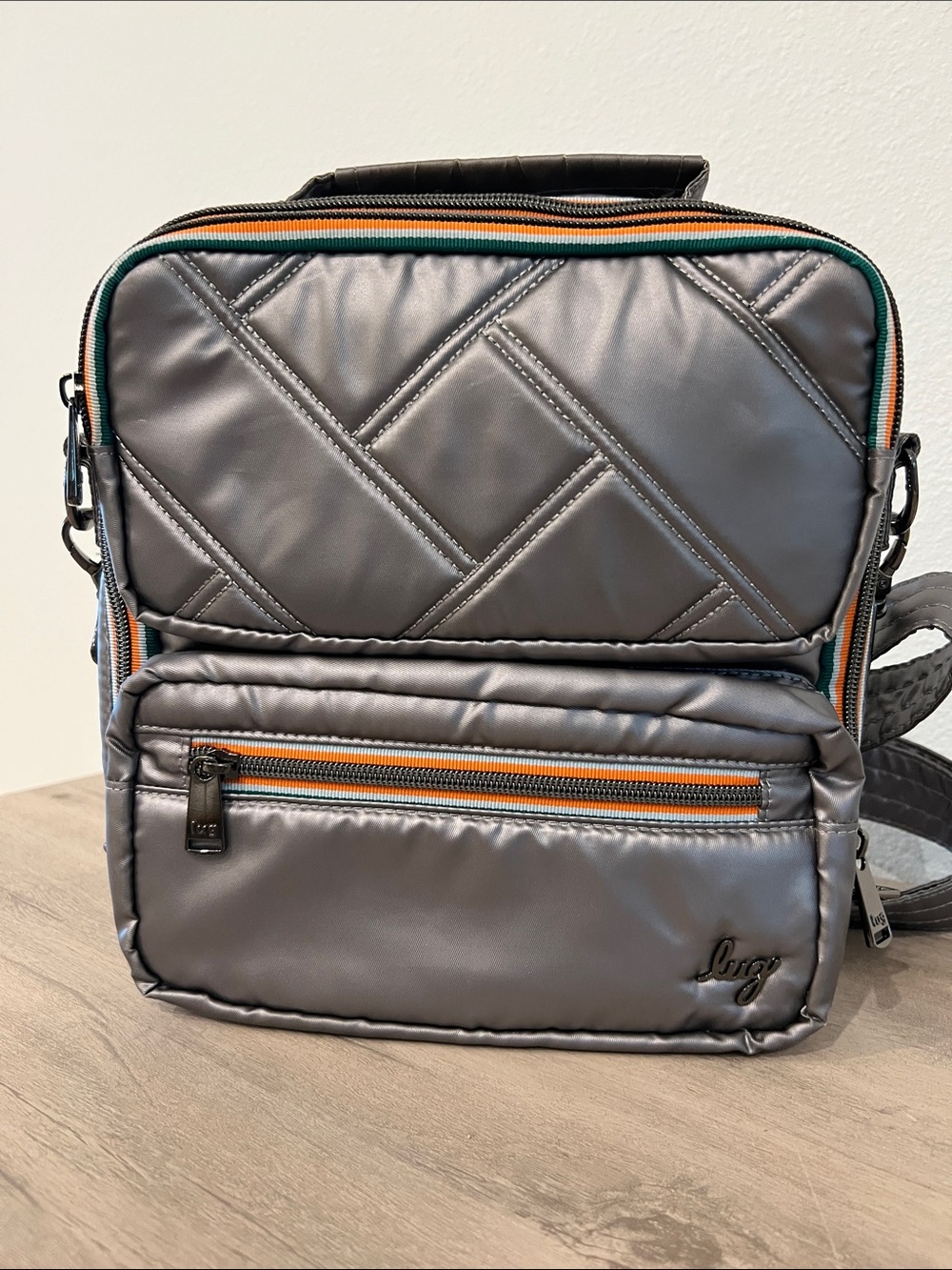 Lug Wrangler Metallic Gray Quilted Crossbody with Orange & Teal Trim